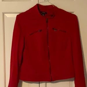 Red jacket with decorative zippers